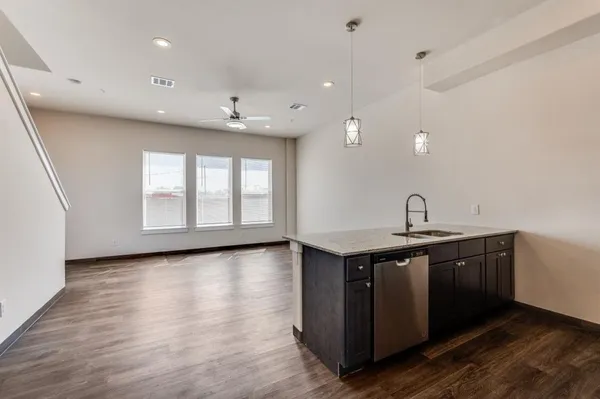 a picture of a bench in front of a wall