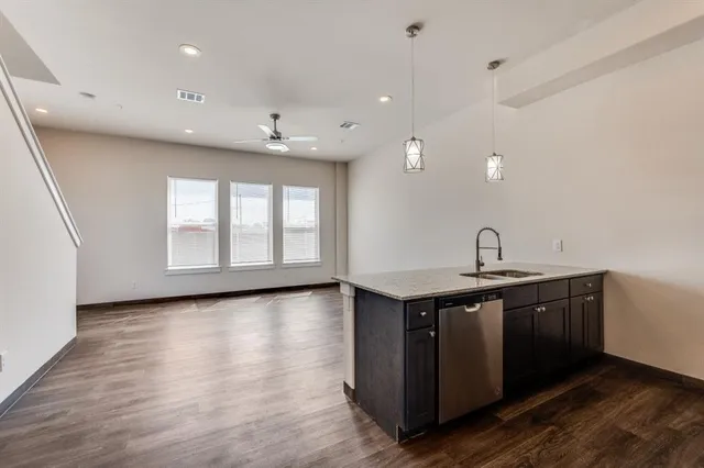 a picture of a bench in front of a wall