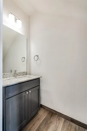 a view of kitchen with stainless steel appliances refrigerator oven and cabinets