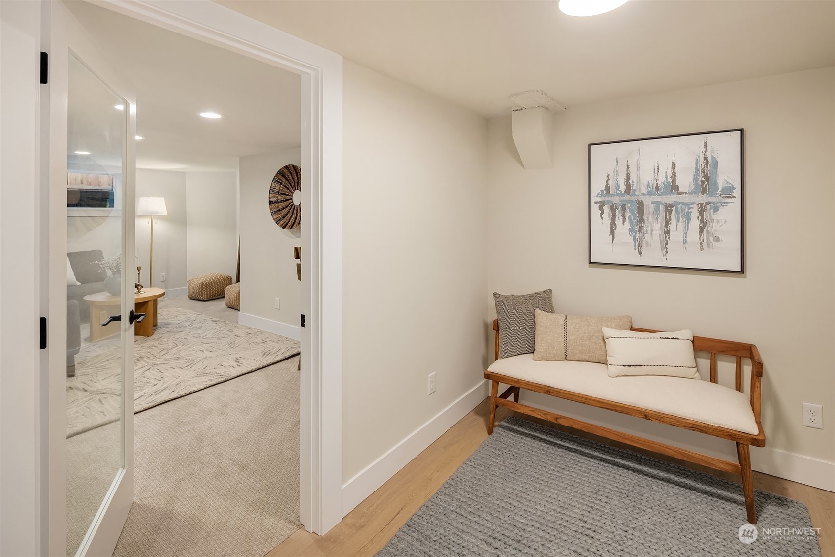 8021 Wallingford Avenue North Seattle, WA 98103 - Photo 20 of 39 a spacious bedroom with a bed and a couch