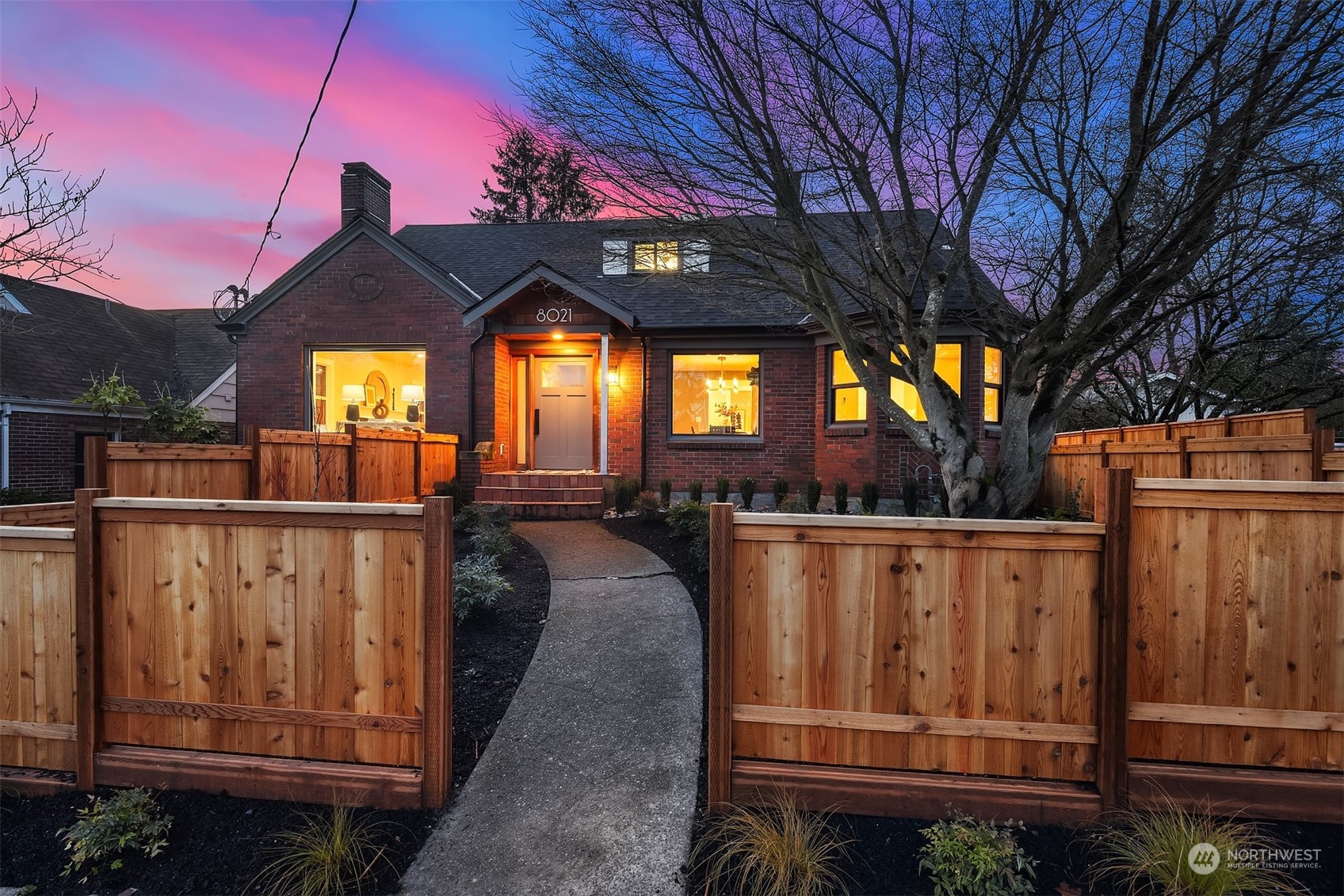 8021 Wallingford Avenue North Seattle, WA 98103 - Photo 2 of 39 a view of a house with backyard and deck