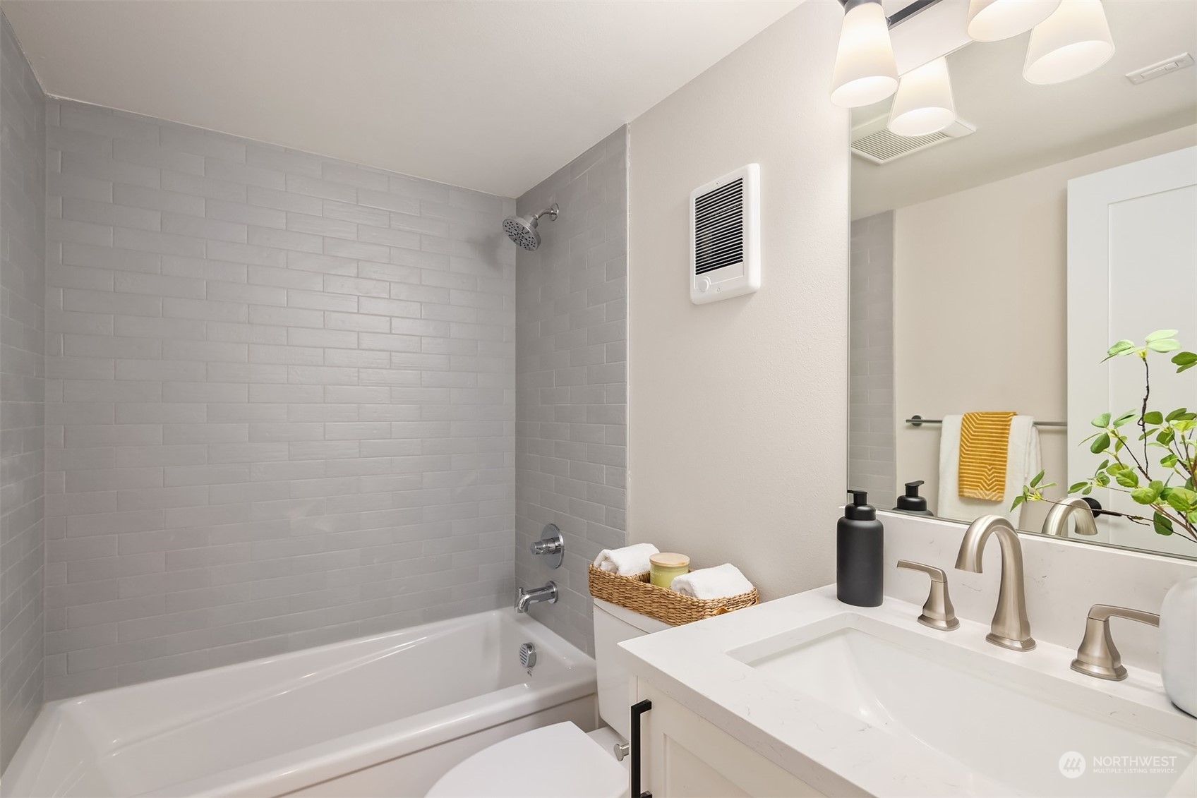8021 Wallingford Avenue North Seattle, WA 98103 - Photo 23 of 39 a bathroom with a sink and a bathtub
