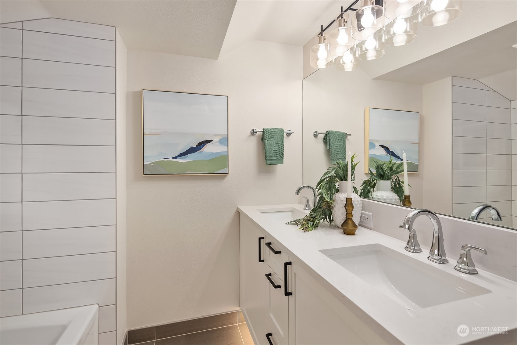 8021 Wallingford Avenue North Seattle, WA 98103 - Photo 25 of 39 a bathroom with a double vanity sink and a mirror