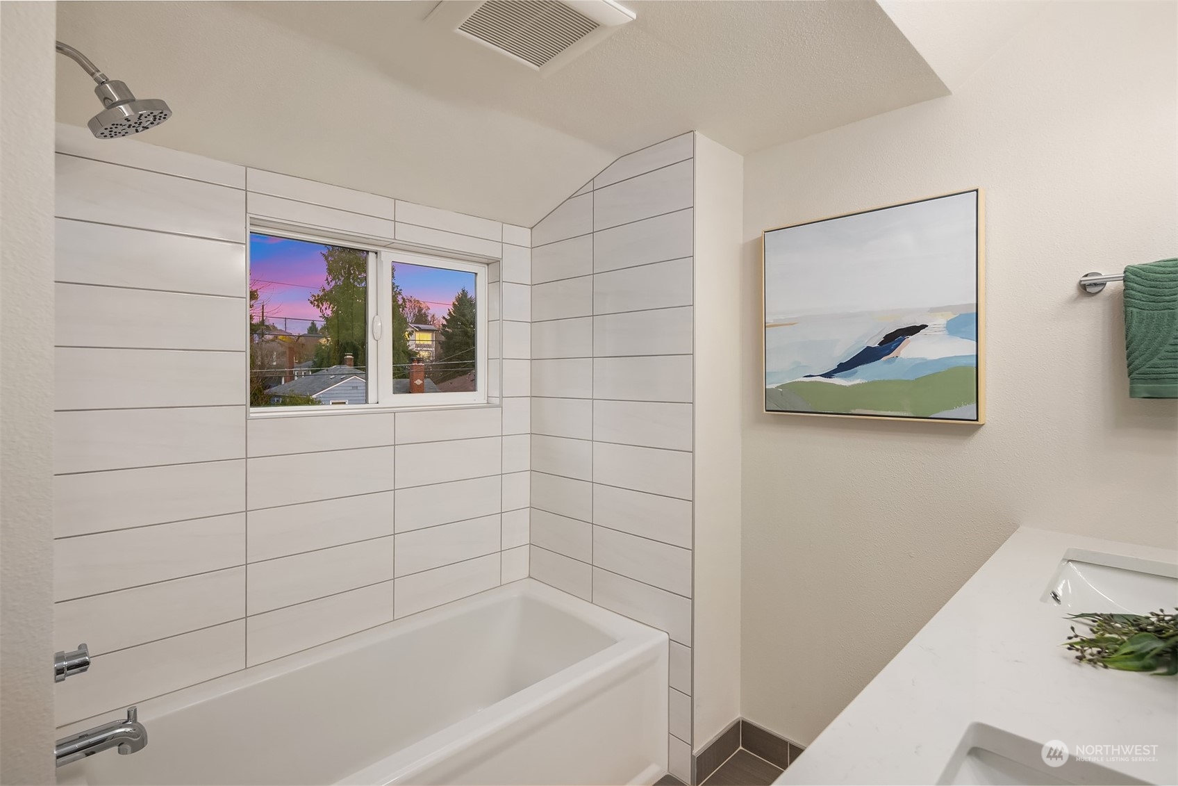 8021 Wallingford Avenue North Seattle, WA 98103 - Photo 26 of 39 a bathroom with a bathtub and a shower