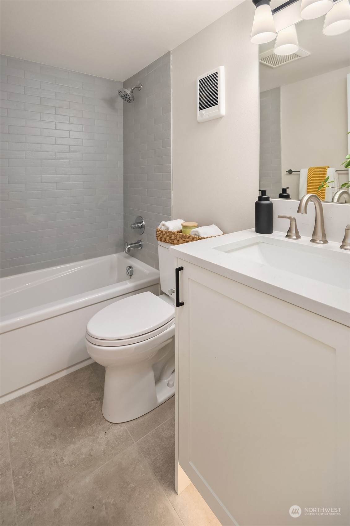 8021 Wallingford Avenue North Seattle, WA 98103 - Photo 29 of 39 a bathroom with a toilet a sink and bathtub