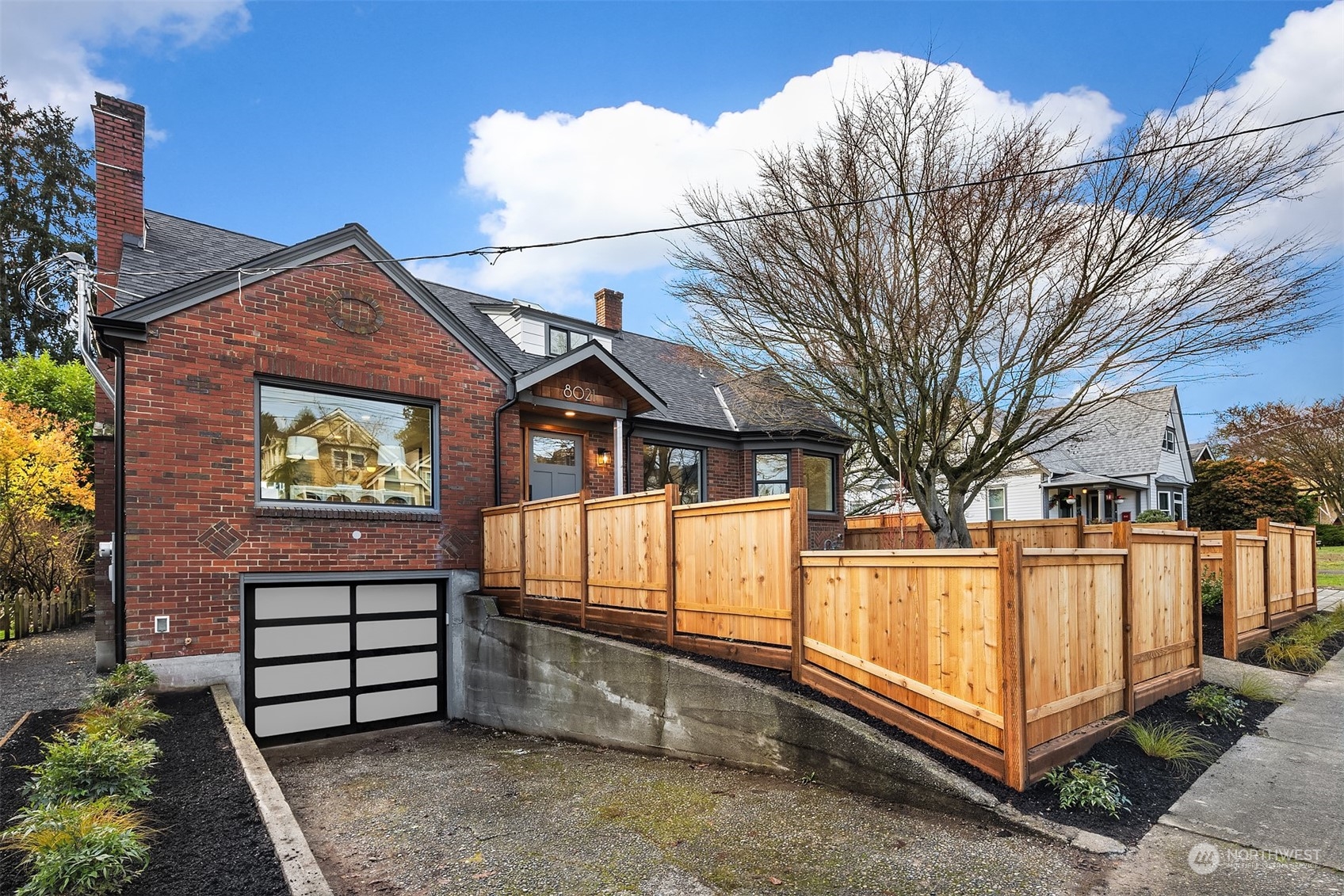 8021 Wallingford Avenue North Seattle, WA 98103 - Photo 34 of 39 a view of a wooden fence