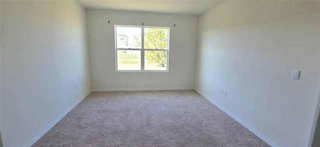 an empty room with a window