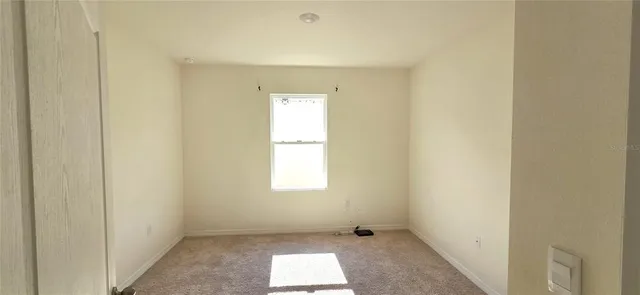 an empty room with a window