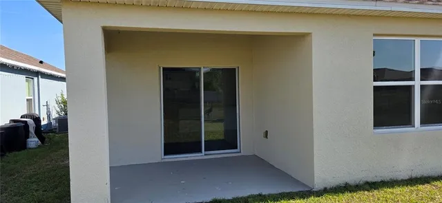 a view of a backyard of a house