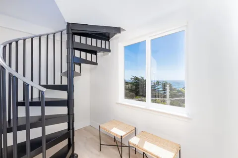 a view of a livingroom with furniture
