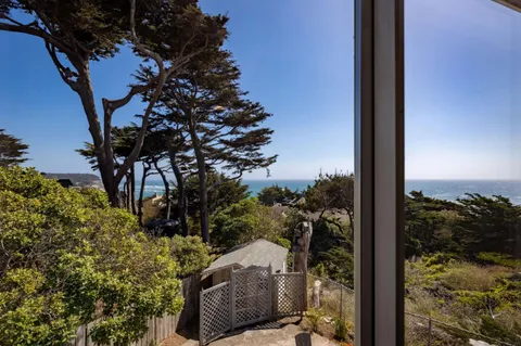 a view of a balcony with an outdoor space