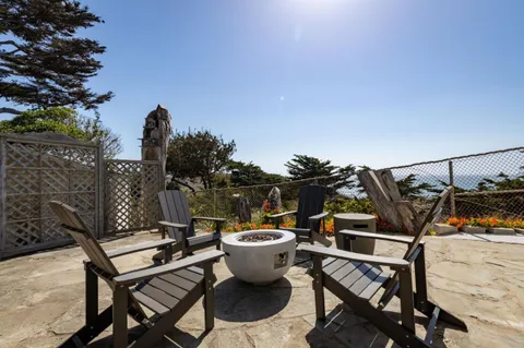 a view of a terrace with chairs