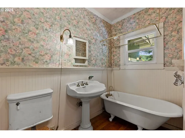 a bathroom with a sink toilet and a bathtub