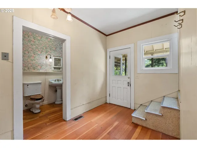 a living room with a furniture and a window