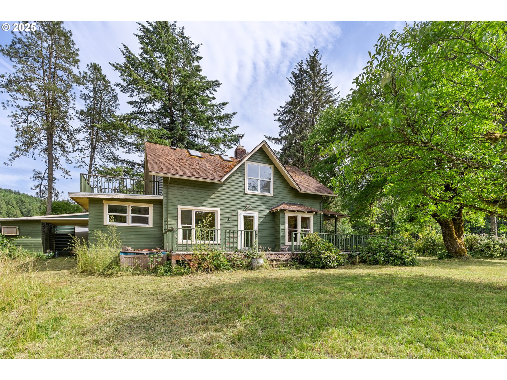 83015 Peninsula Road Fall Creek, OR 97438 - Photo 40 of 40 a front view of a house with a garden