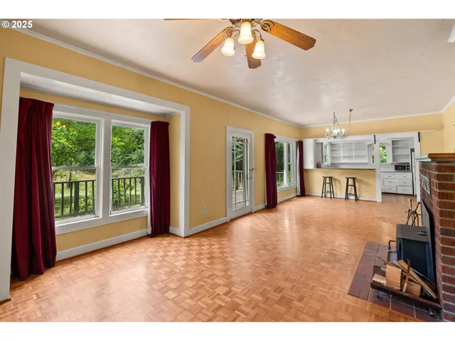 a view of an empty room with a window