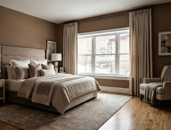 a spacious bedroom with a bed and glass window