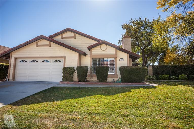 13648 Laurelhurst Road Moorpark, CA 93021 - Photo 1 of 32 a view of a house with swimming pool and sitting area