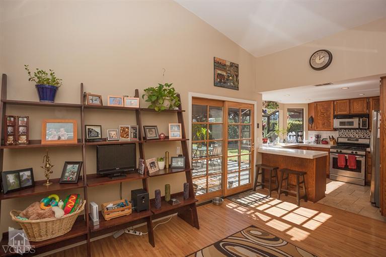 13648 Laurelhurst Road Moorpark, CA 93021 - Photo 11 of 32 a living room with furniture a rug and a flat screen tv