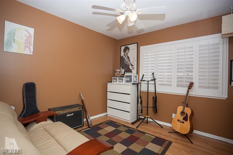 13648 Laurelhurst Road Moorpark, CA 93021 - Photo 17 of 32 a view of a workspace with furniture and a window