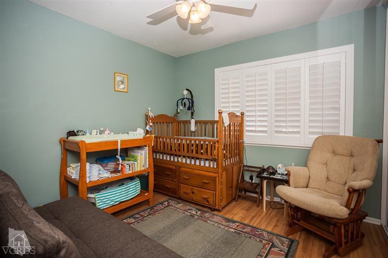 13648 Laurelhurst Road Moorpark, CA 93021 - Photo 18 of 32 a bedroom with furniture and a window