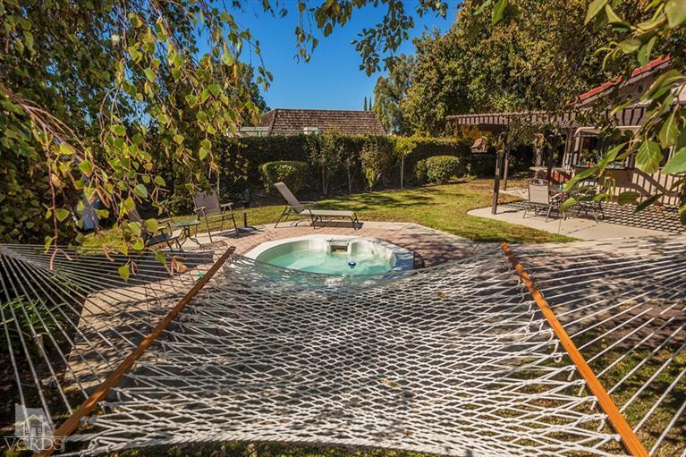 13648 Laurelhurst Road Moorpark, CA 93021 - Photo 26 of 32 a view of a swimming pool with a patio