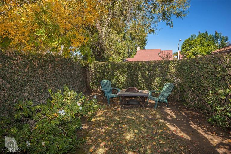 13648 Laurelhurst Road Moorpark, CA 93021 - Photo 29 of 32 a view of a bench in a backyard