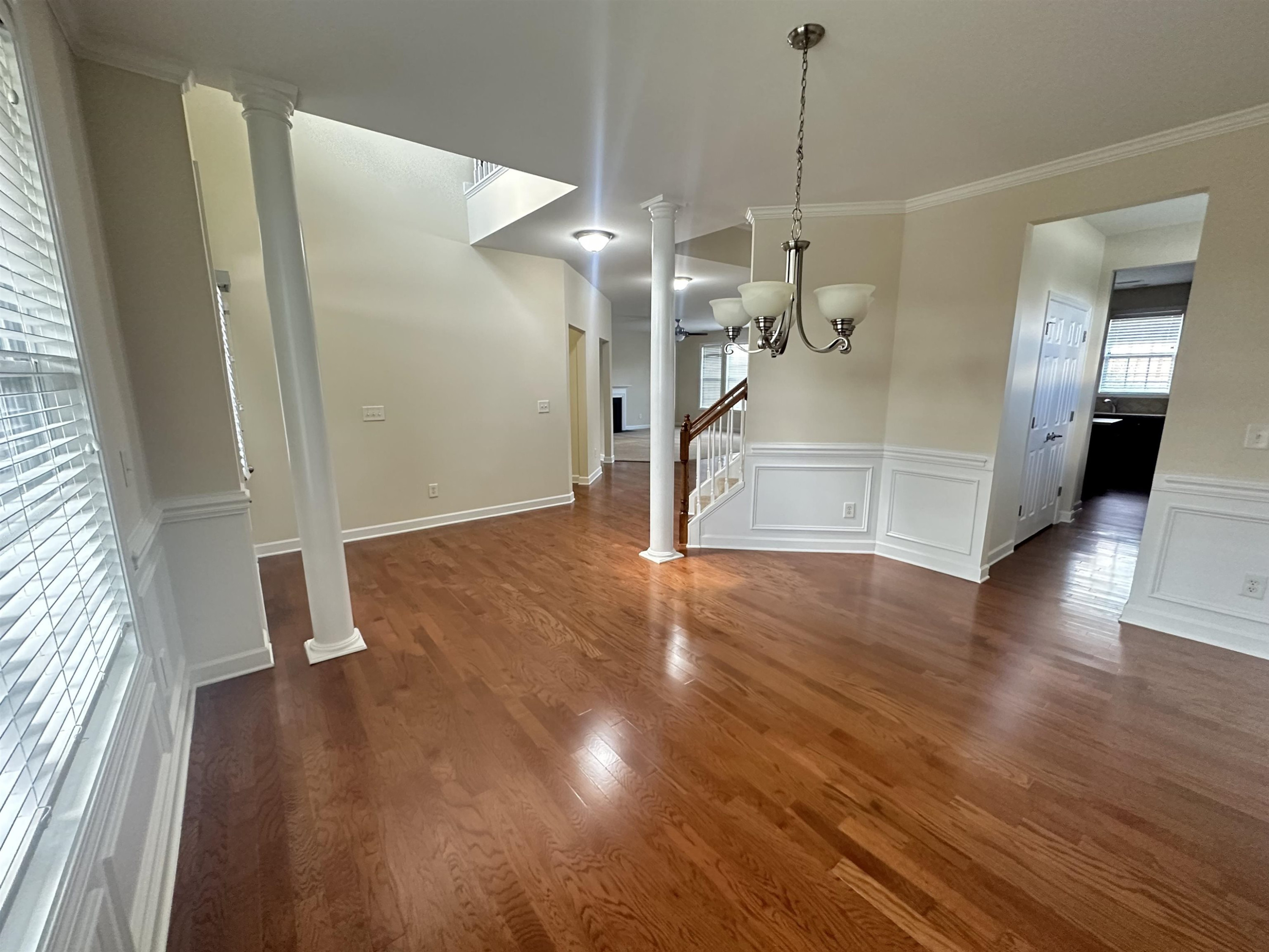 5161 Holly Ridge Farm Road Raleigh, NC 27616 - Photo 5 of 35 a view of a room with wooden floor and windows