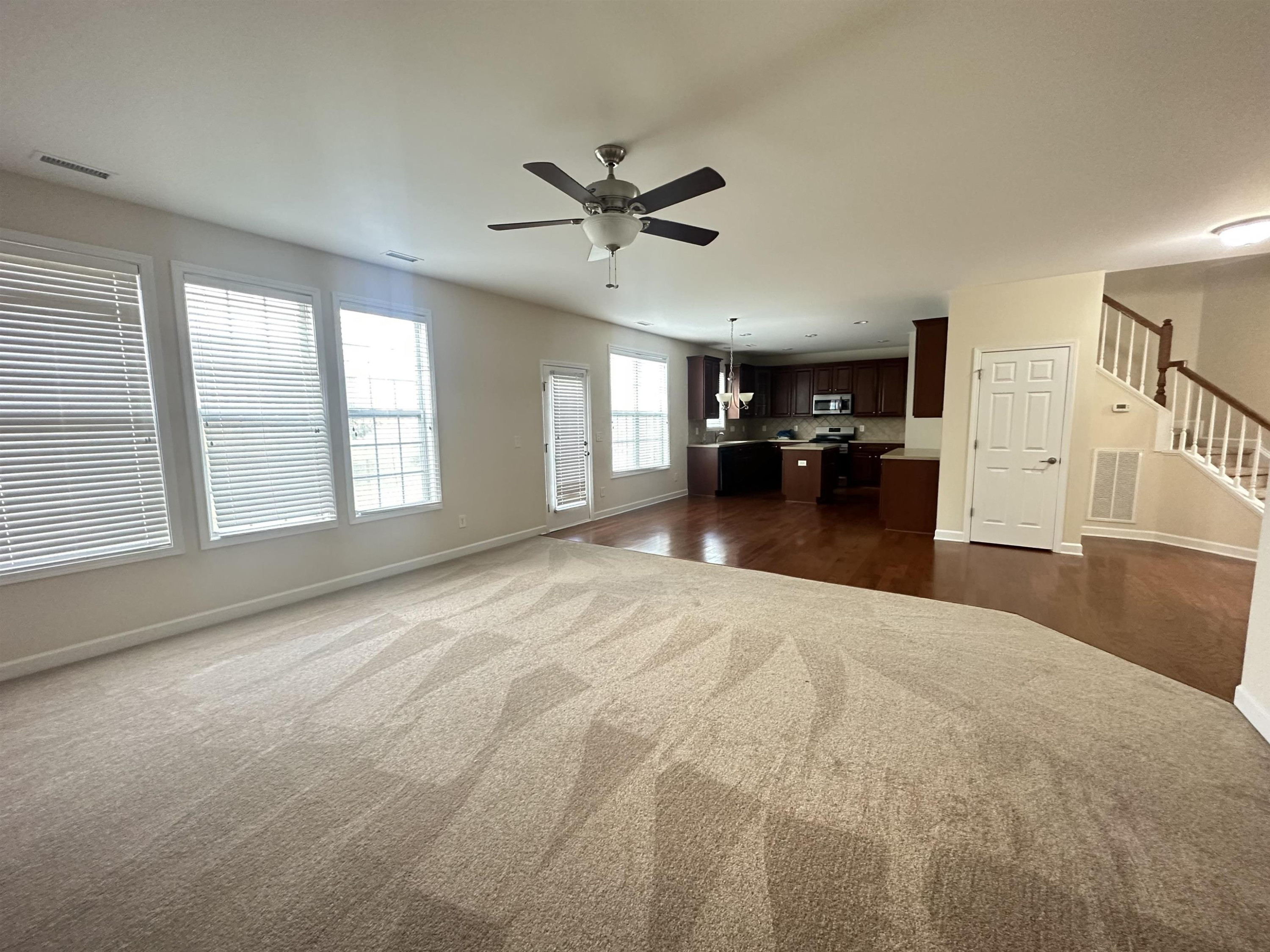 5161 Holly Ridge Farm Road Raleigh, NC 27616 - Photo 8 of 35 a view of a livingroom with a ceiling fan and window