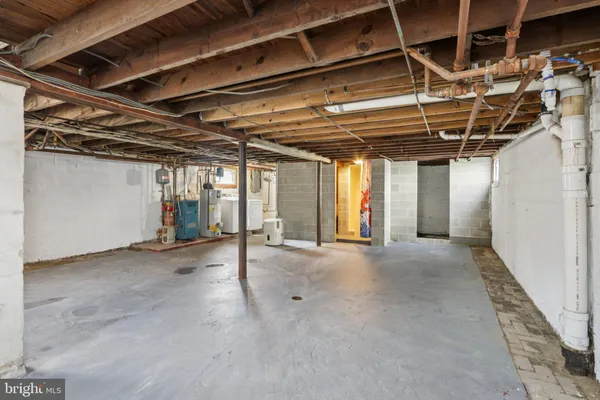 a view of a room with wooden walls