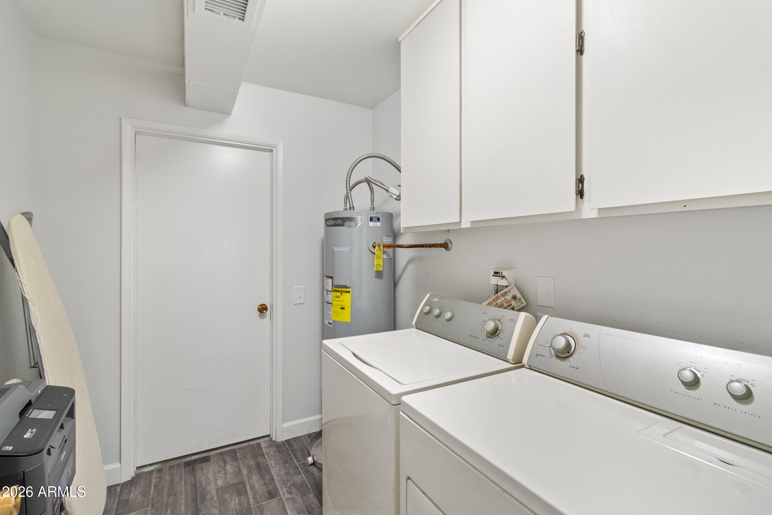 9801 West Pleasant Valley Road Sun City, AZ 85351 - Photo 19 of 26 a utility room with dryer and washer