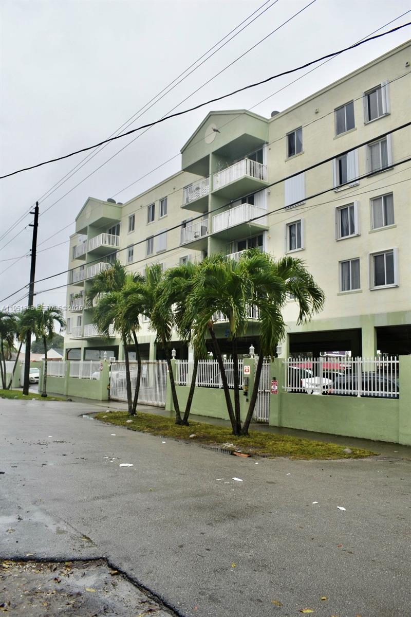616 Northwest 26th Avenue, Unit 210 Miami, FL 33125 - Photo 2 of 23 a view of building with a street