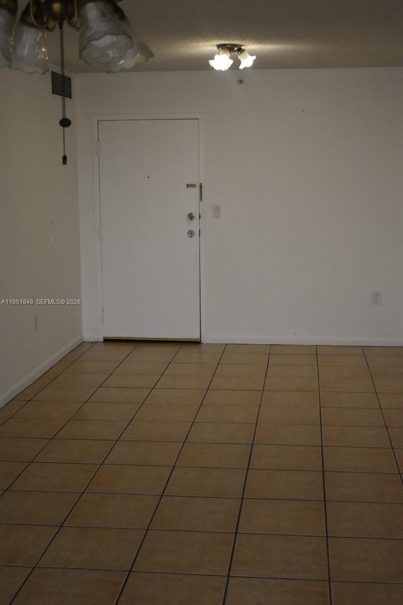 616 Northwest 26th Avenue, Unit 210 Miami, FL 33125 - Photo 5 of 23 a view of empty room