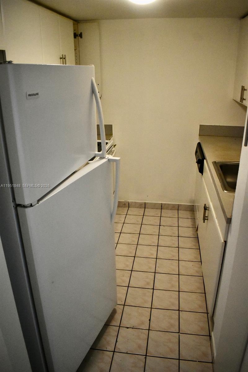 616 Northwest 26th Avenue, Unit 210 Miami, FL 33125 - Photo 6 of 23 a view of an empty room