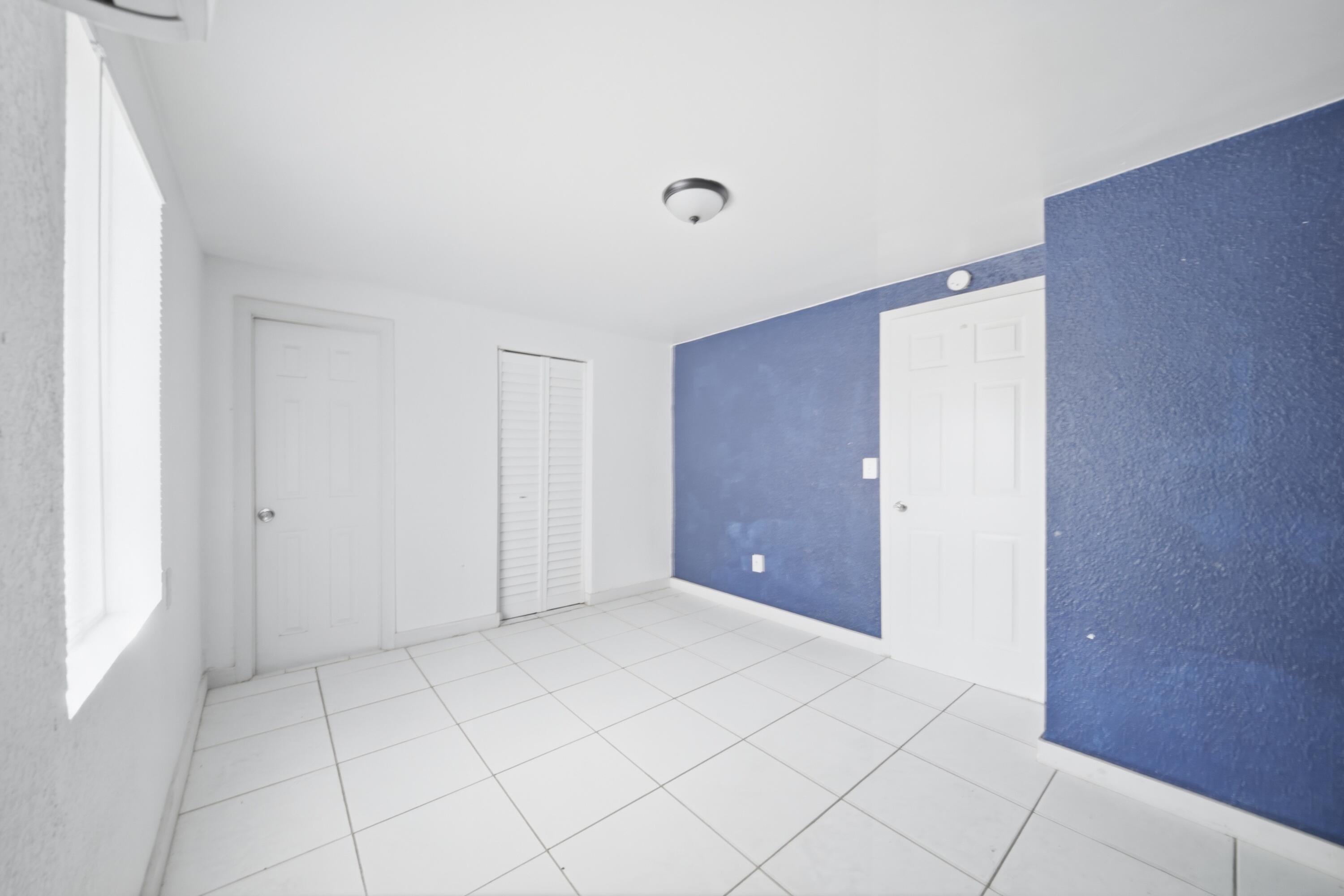 1796 Northwest 112th Street Miami, FL 33167 - Photo 19 of 25 a view of an empty room