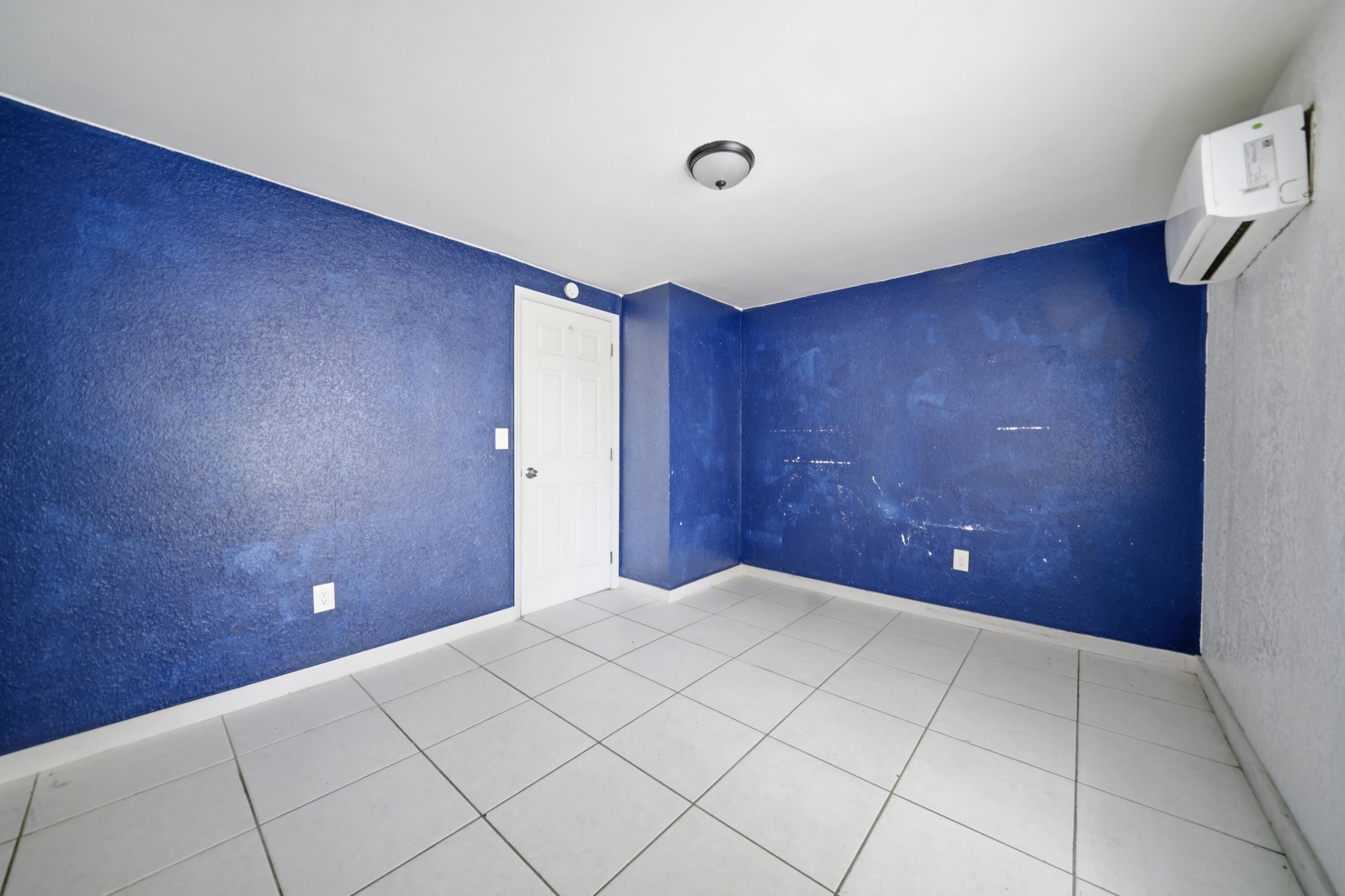 1796 Northwest 112th Street Miami, FL 33167 - Photo 22 of 25 a view of a livingroom with an empty space