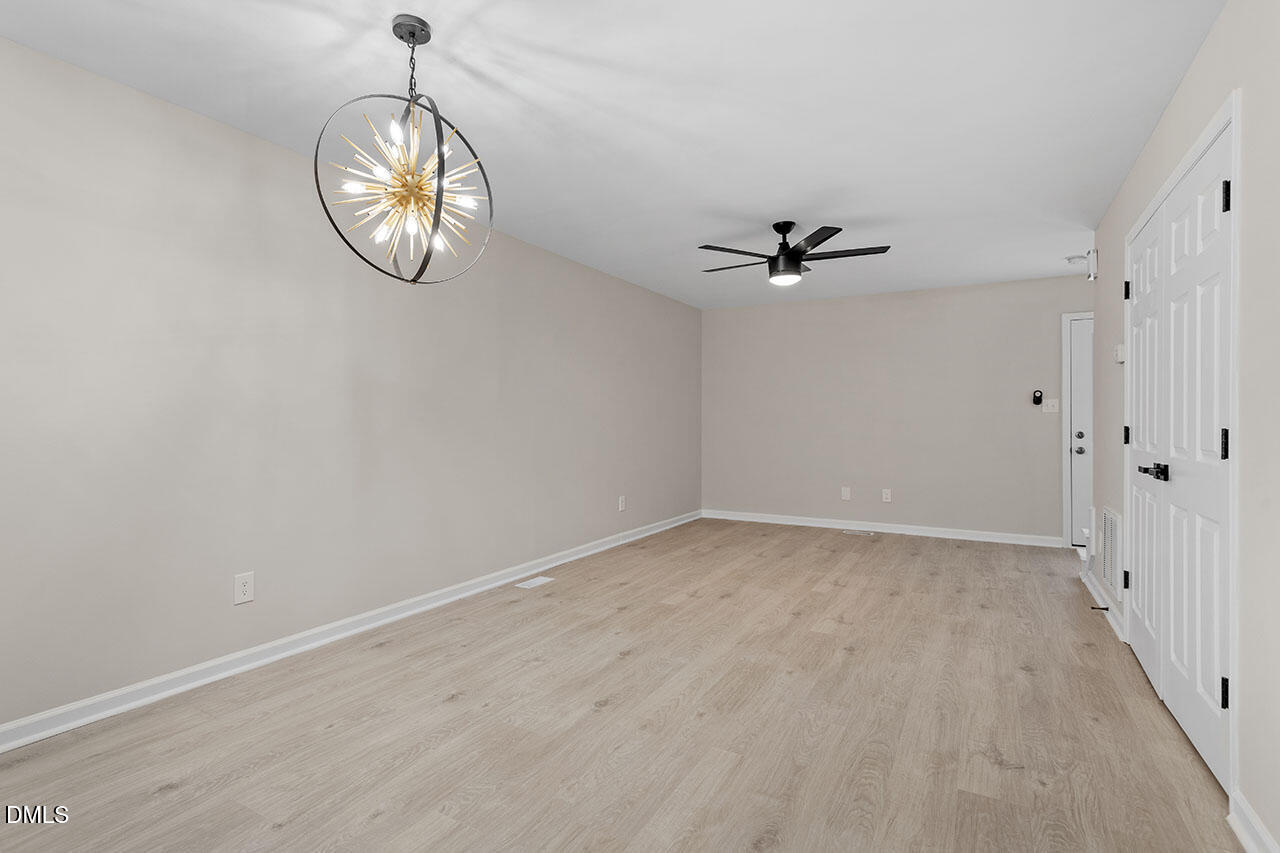 389 East Williams Street Angier, NC 27501 - Photo 14 of 29 wooden floor in an empty room