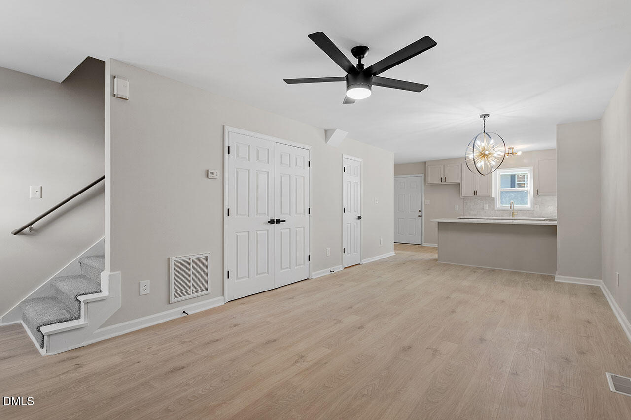 389 East Williams Street Angier, NC 27501 - Photo 18 of 29 a view of a livingroom with a ceiling fan