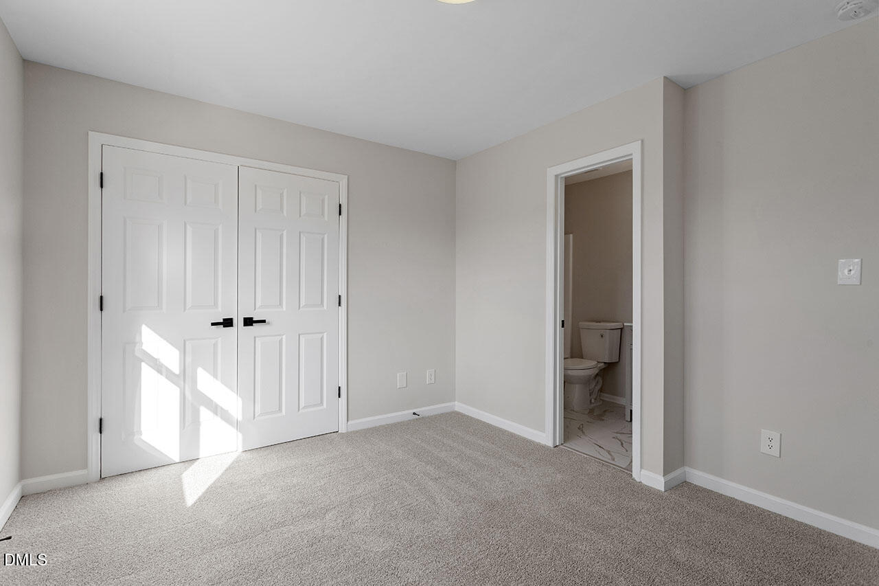 389 East Williams Street Angier, NC 27501 - Photo 23 of 29 a view of an empty room