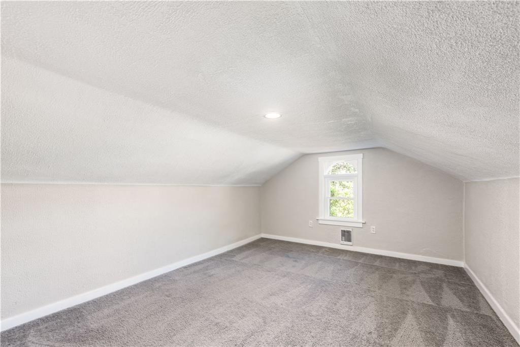 718 Maytide Street Pittsburgh, PA 15227 - Photo 13 of 19 an empty room that has a window