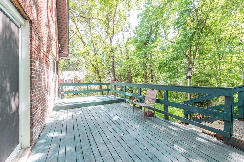 718 Maytide Street Pittsburgh, PA 15227 - Photo 19 of 19 a view of deck with a large trees