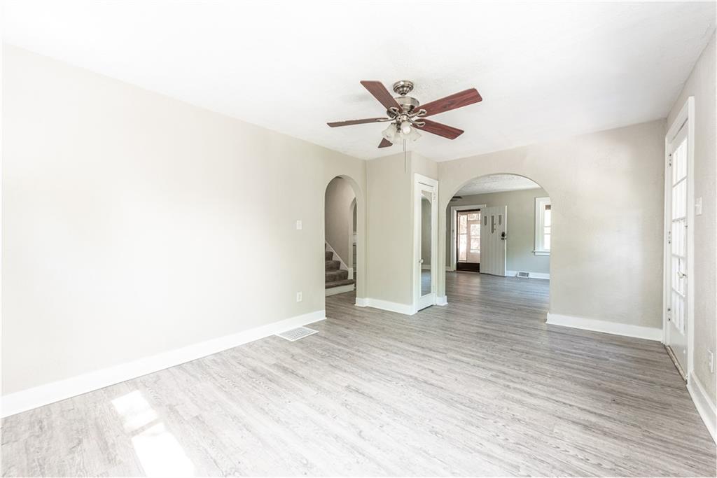 718 Maytide Street Pittsburgh, PA 15227 - Photo 4 of 19 a view of empty room with wooden floor