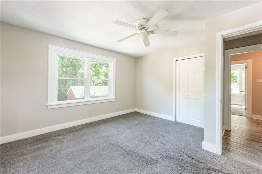 718 Maytide Street Pittsburgh, PA 15227 - Photo 10 of 19 an empty room with fan and windows