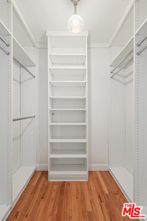 1710 Malcolm Avenue, Unit 101 Los Angeles, CA 90024 - Photo 12 of 18 a view of walk in closet with empty racks