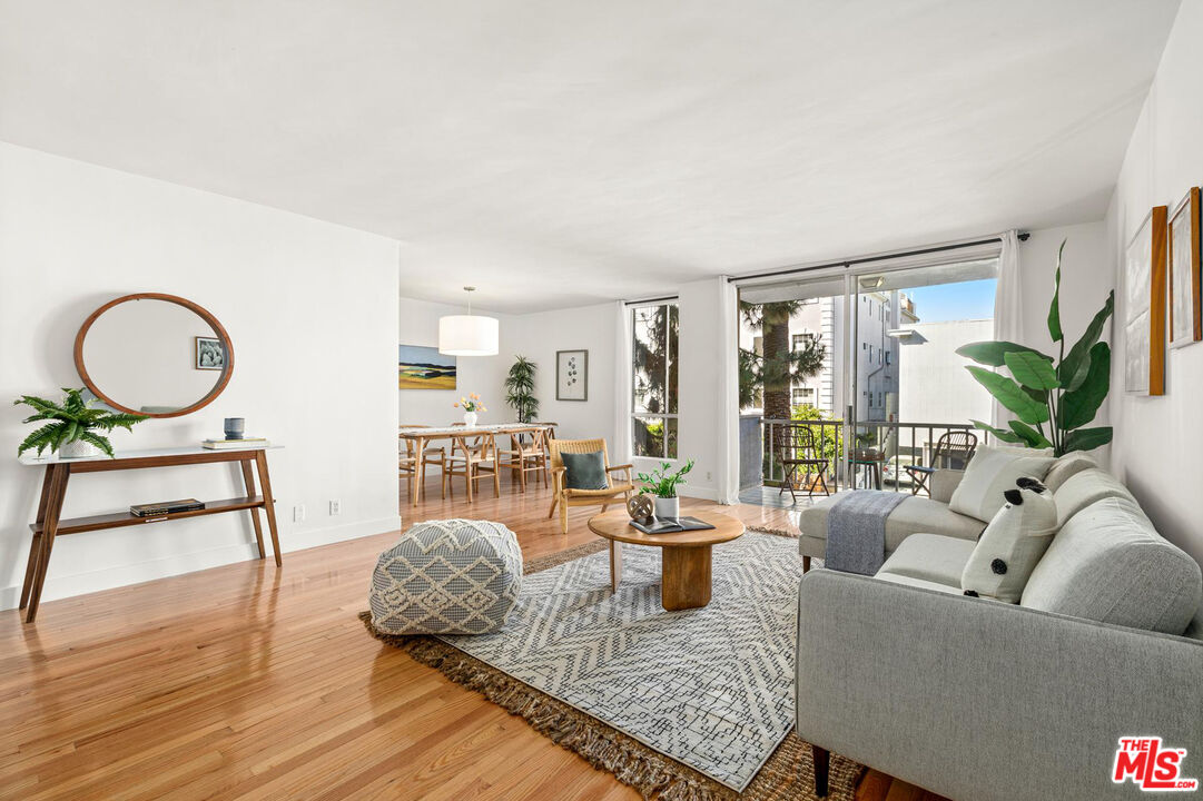 1710 Malcolm Avenue, Unit 101 Los Angeles, CA 90024 - Photo 2 of 18 a living room with furniture
