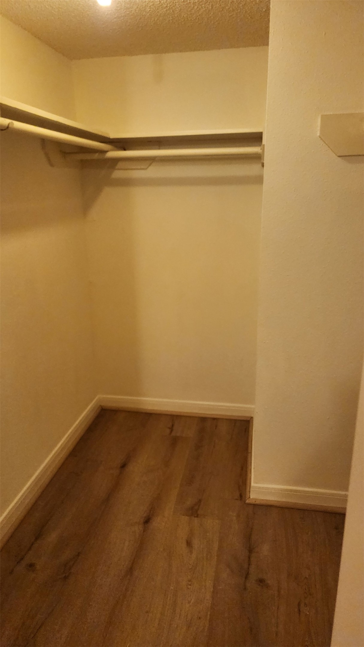 2750 Holly Hall Street, Unit 101 Houston, TX 77054 - Photo 5 of 6 a view of a room with racks on the wall