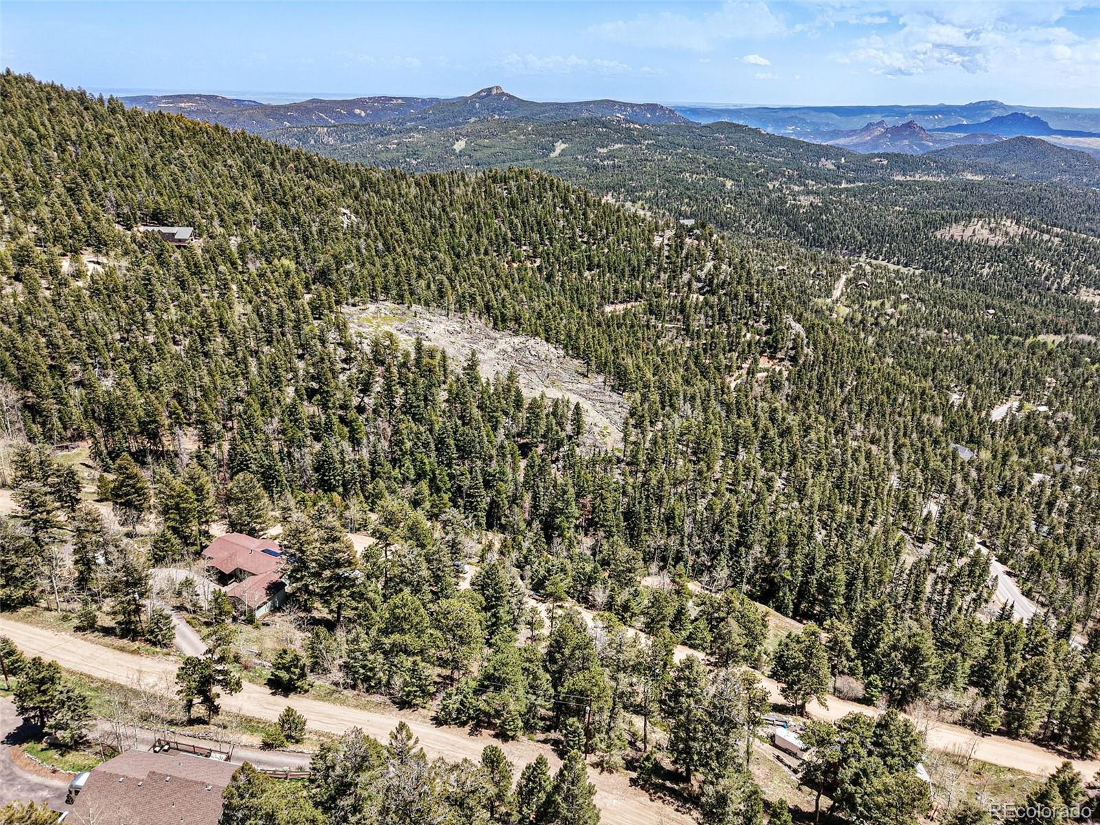 11618 Nichols Way Conifer, CO 80433 - Photo 27 of 39 a view of a city with mountain
