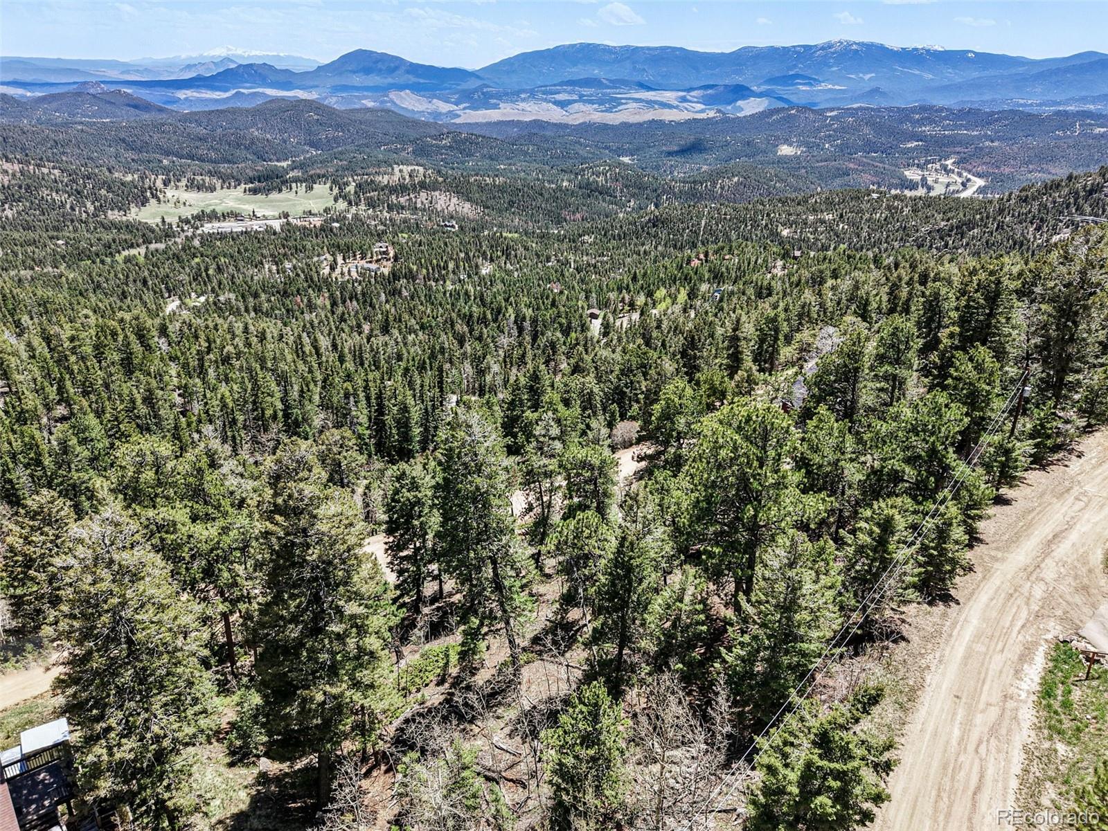 11618 Nichols Way Conifer, CO 80433 - Photo 6 of 39 a view of a city with mountain