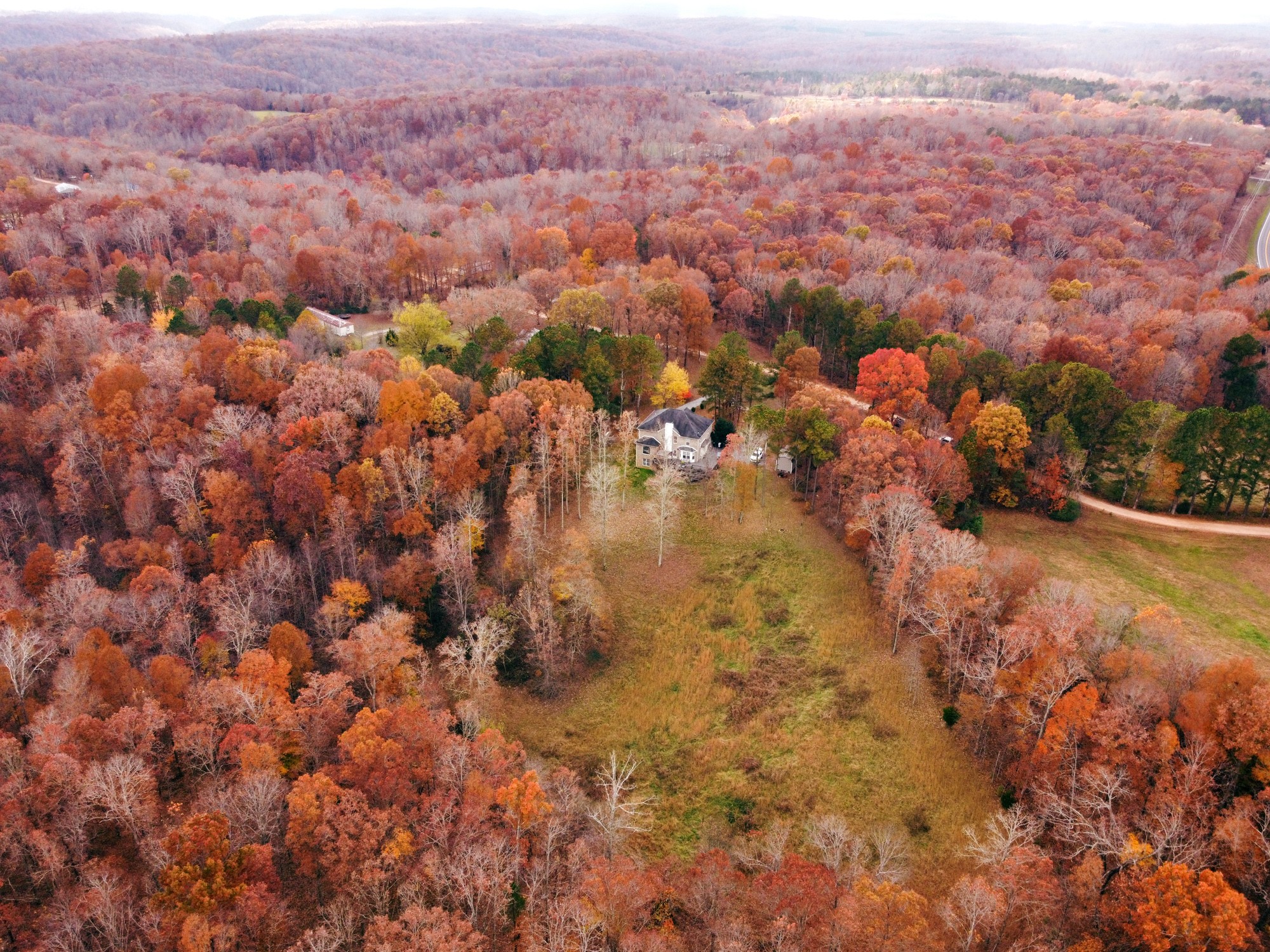 5061 Spears Road Centerville, TN 37033 - Photo 13 of 55 an aerial view of house with yard and mountain view in back
