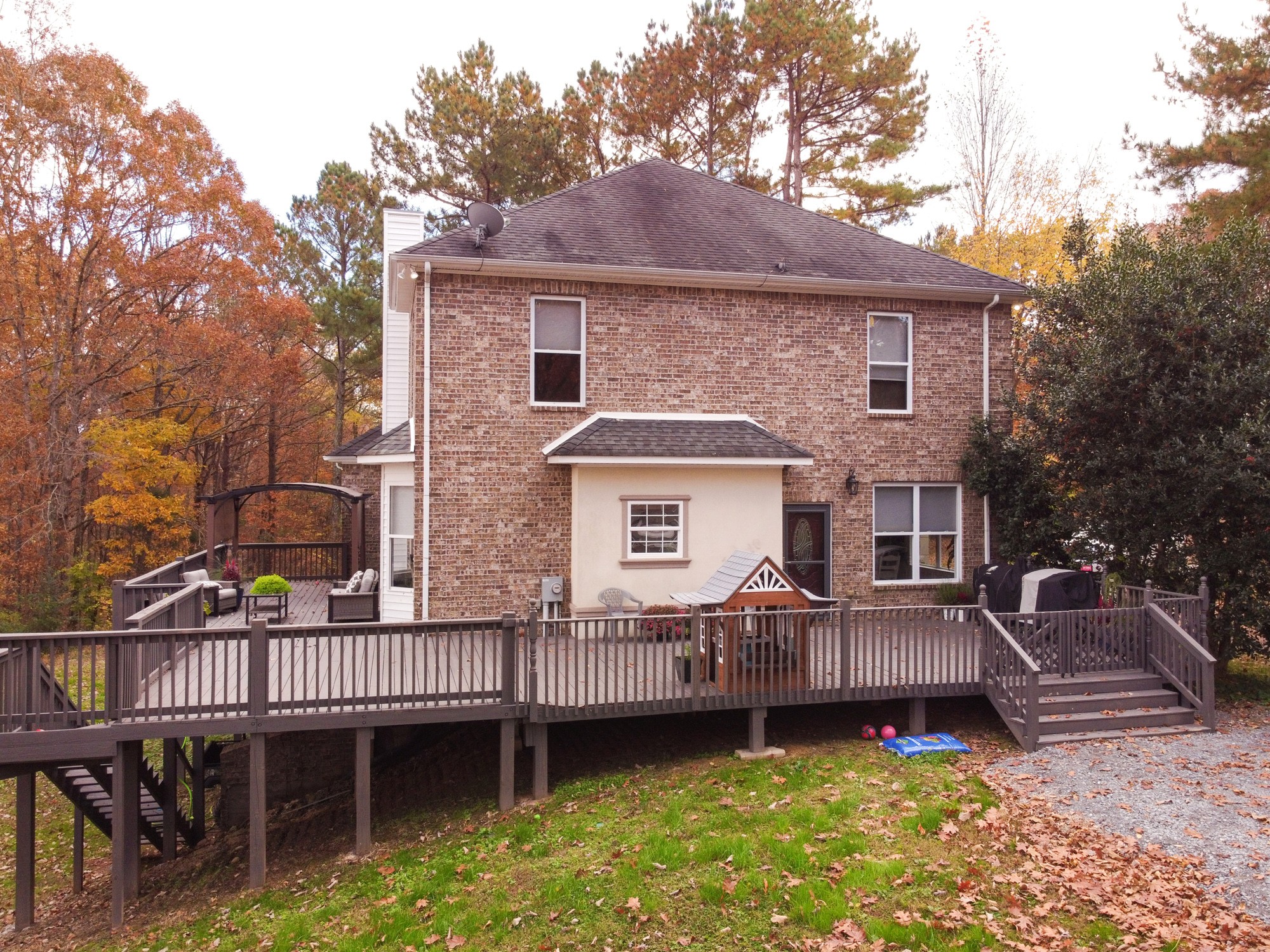 5061 Spears Road Centerville, TN 37033 - Photo 19 of 55 a view of a house with a roof deck and furniture